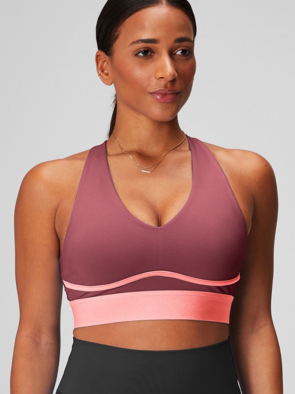 Fabletics Two-Tone V-Neck Sports Bra in Mauve and Light Pink
